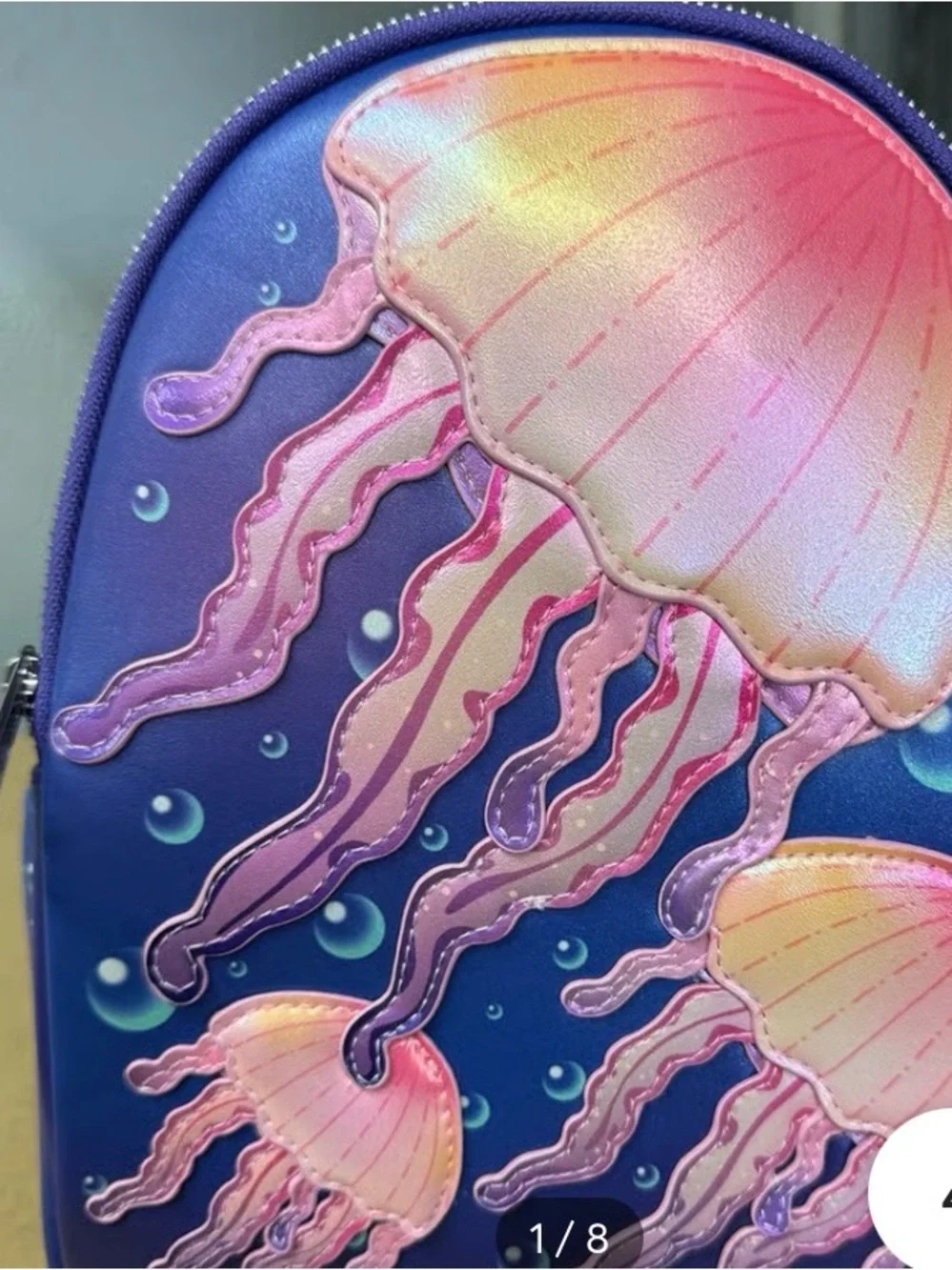 New with tags. Light up seaworld exclusive jellyfish loungefly mini backpack.